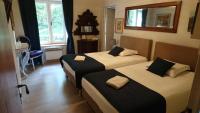 Deluxe Doppel-/Zweibettzimmer mit Gartenblick