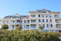 Inselblume 16 - Ferienwohnung mit Meerblick in der Strandburg B2.6 - Chambres d’hôtes Fehmarn