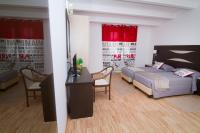 Camera Quadrupla Superior