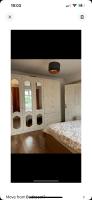 Large room with single bed, work desk and double wardrobe - B&B