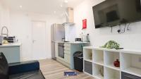 Deluxe Studio met Queensize Bed
