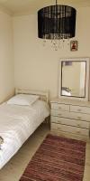 Tweepersoonskamer met 2 Aparte Bedden en Gedeelde Badkamer