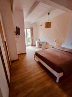 Chambre Lit Queen-Size - Vue sur Jardin