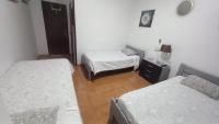 Camera Doppia con Letti Singoli con Letto Supplementare