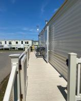 Promenade park 8 Berth caravan next to the beach entrance, WIFI included - Chambres d'hôtes Ingoldmells