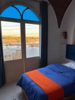Triple Room with river view and balcony