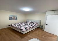 One-Bedroom Apartment with Balcony and City View