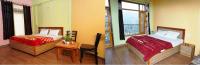Zimmer mit Queensize-Bett und Balkon