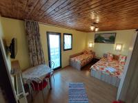 Habitación Doble con balcón (2 adultos + 1 niño)