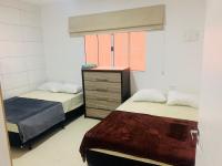 Apartamento aconchegante com 01 quarto no Tremembé-SP - Chambres d'hôtes São Paulo