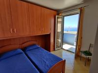 Two-Bedroom Apartment with Balcony and Sea View