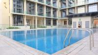 Greywood Oasis 2BR Elegant Retreat Near Masdar Park & City Centre Masdar - Ferienwohnung Abu Dhabi