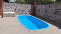 Casa com Piscina Balneário Oásis - Quadriciclo - B&B Peruíbe