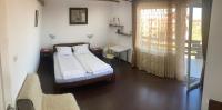 Chambre Lit King-Size avec Balcon