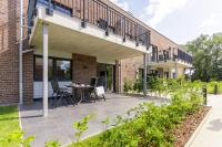 Dorumer Seestern - Ferienwohnung mit Terrasse und Sauna - Chambres d’hôtes