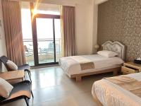 Zweibettzimmer mit Meerblick