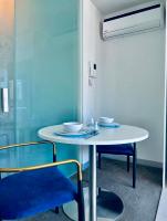One-Bedroom Apartment with Balcony and City View