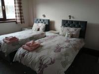 Tweepersoonskamer met 2 Aparte Bedden