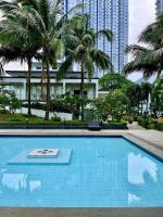 Spacious and Aesthetic 2 Bedroom with City-View Balcony at Grass Residences QC - B&B Manila