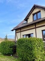 Dom na wzgórzu z widokiem na jezioro - B&B Brodnica Dolna