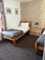 Tweepersoonskamer met 2 Aparte Bedden
