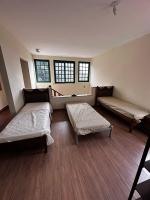 Basic Dreibettzimmer mit Gemeinschaftsbad