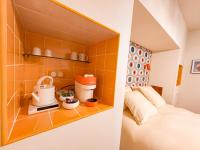 Kamer met Queensize Bed en Uitzicht op de Tuin