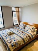 Three-Bedroom Premium Apartment with Balcony