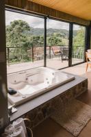 Elegante bangalô de campo 1- Taquaras Huts - Chambres d’hôtes Rancho Queimado