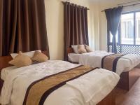Chambre Lits Jumeaux avec Salle de Bains Privative