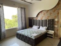 Chambre Double Deluxe (2 Adultes + 1 Enfant)