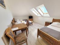 Dreibettzimmer mit Meerblick