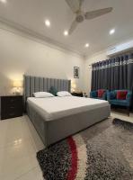 Cozy & Peaceful Rooms Near Lyallpur Galleria - B&B