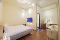 Chambre Lit Queen-Size avec Balcon