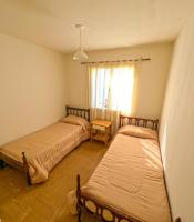 Einzelbett im Schlafsaal