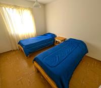 Einzelbett im Schlafsaal