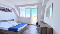 Four-Bedroom Apartment with Balcony