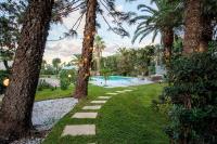 Numeroquattro-Light Green, Open Space con vista sul giardino e piscina - B&B Siracusa