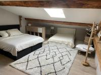 Appartement atypique centre village - Bed and Breakfast