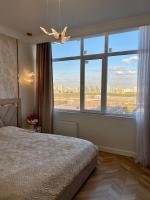 Вид на Ботанический сад и Астану Арену! Рядом Барыс Арена и Велотрек , мед объекты столицы! - Bed and Breakfast Astana