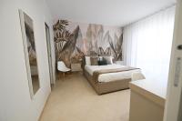 Camera Deluxe (2 Adulti + 1 Bambino)