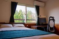 Camera Singola con Doccia e Servizi Igienici in Comune