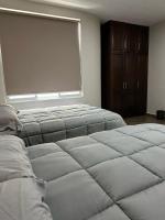 Deluxe Doppelzimmer mit 2 Doppelbetten