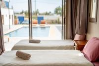 Chambre Triple - Vue sur la Piscine