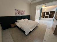 Deluxe One-Bedroom Apartment with City View