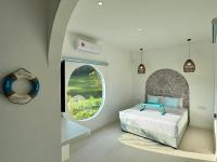 Chambre Deluxe (2 Adultes + 1 Enfant)