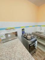 Family Apartment in San Cristóbal with 2 Bedrooms, 4 Beds, Living Room, Dining Area, Kitchen, Satellite WiFi and 1 Bathroom with Hot Water - CoralBay - Galápagos Home - Chambres d'hôtes Puerto Baquerizo Moreno