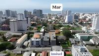 Apartamento centralizado à poucas quadras do mar. - Ferienwohnung Tramandaí