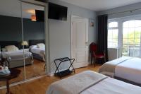 Dreibettzimmer mit Balkon