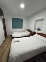 Tweepersoonskamer met 2 Aparte Bedden